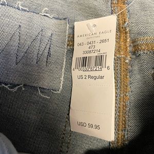 NEW with tags. never worn AMERICAN EAGLE ripped jeans